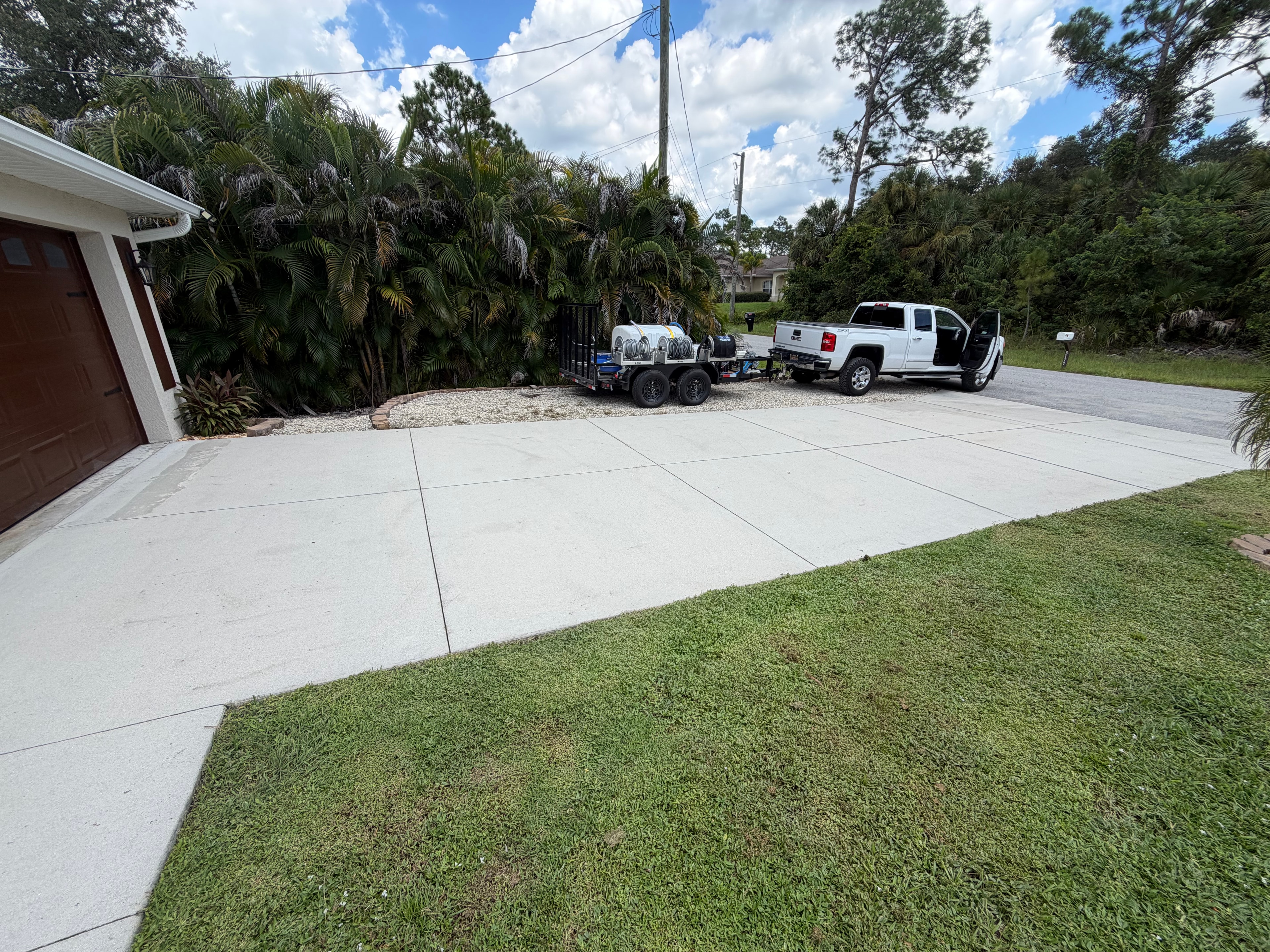 Clean bright driveway after pressure washing